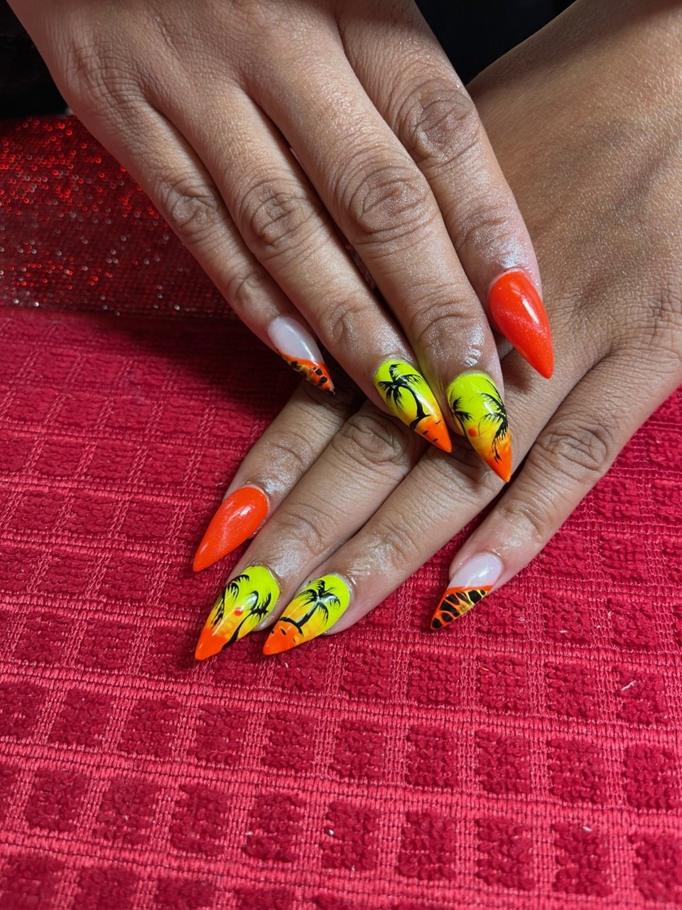Bright orange and yellow tropical palm tree nail art by Velour Nails Studio